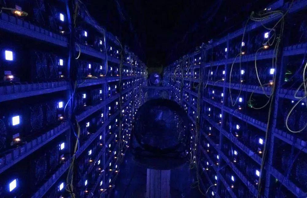 Close-up on a high-tech Bitcoin mining rig with LED indicators