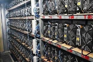 Vast rows of mining rigs operating inside a high-tech mining farm facility