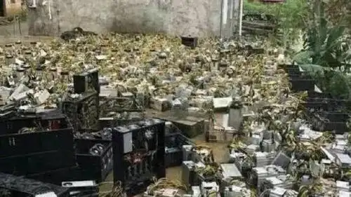 Aerial view of a large Bitcoin mining farm with multiple rigs